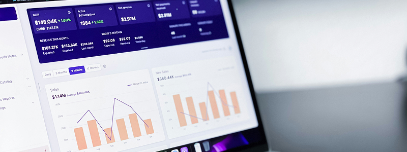 Analytics dashboard on screen with charts and graphs