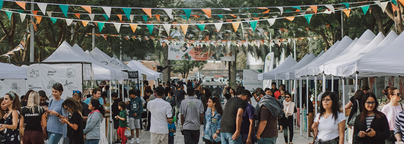 Large outdoor event crowd at entrance